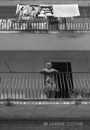 Woman-on-Her-Balcony-Janine-Coyne